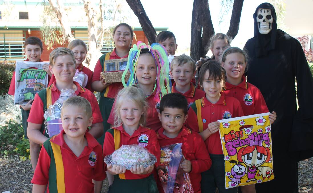 Getting ready for the St Kieran’s Catholic Primary School Mother’s Day are (back) Jamie Ahearn, Kate Hines, Maddison Webber, Lewis McCoy, Hannah Smith, (middle) Cody Midgley, Amy Kuhne, Roy Hines, Thomas Schlencker, Rilee Webber, (front) Ryan Ezzy, Kianna Jacobs and Decan Duncan. 
