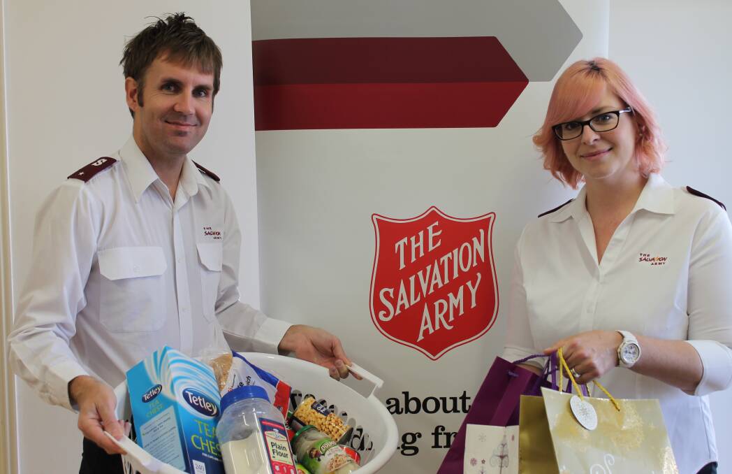 HELP ON THE WAY: Salvation Army Mount Isa Lieutenant Brad Whittle with manager of Serenity House Helen Whittle.