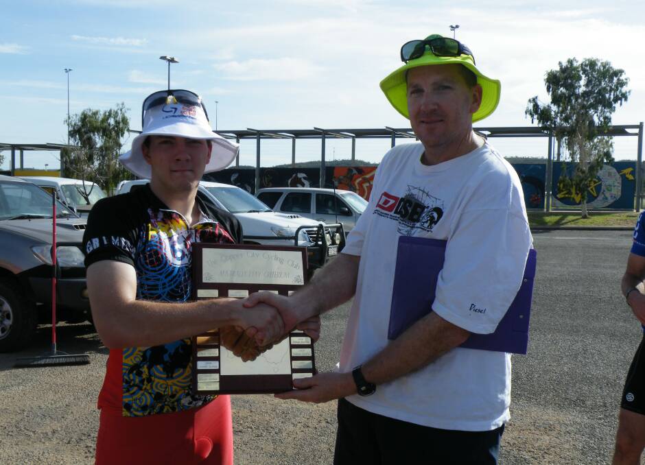 IN FORM: Rory French accepts the perpetual shield from Commissaire Jason Ahearn.