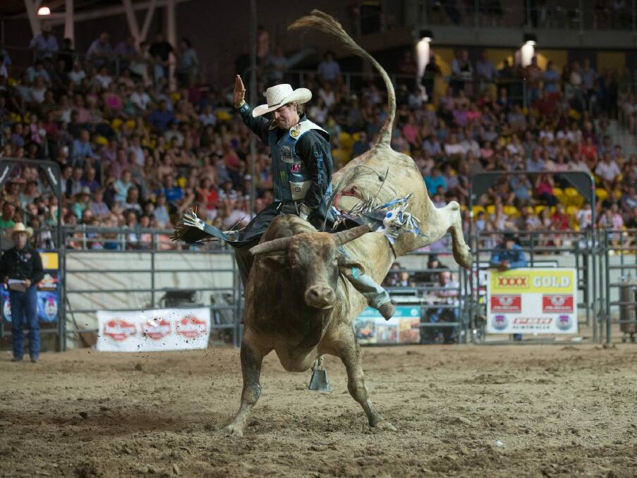 Bull rider Dave Mason in action.