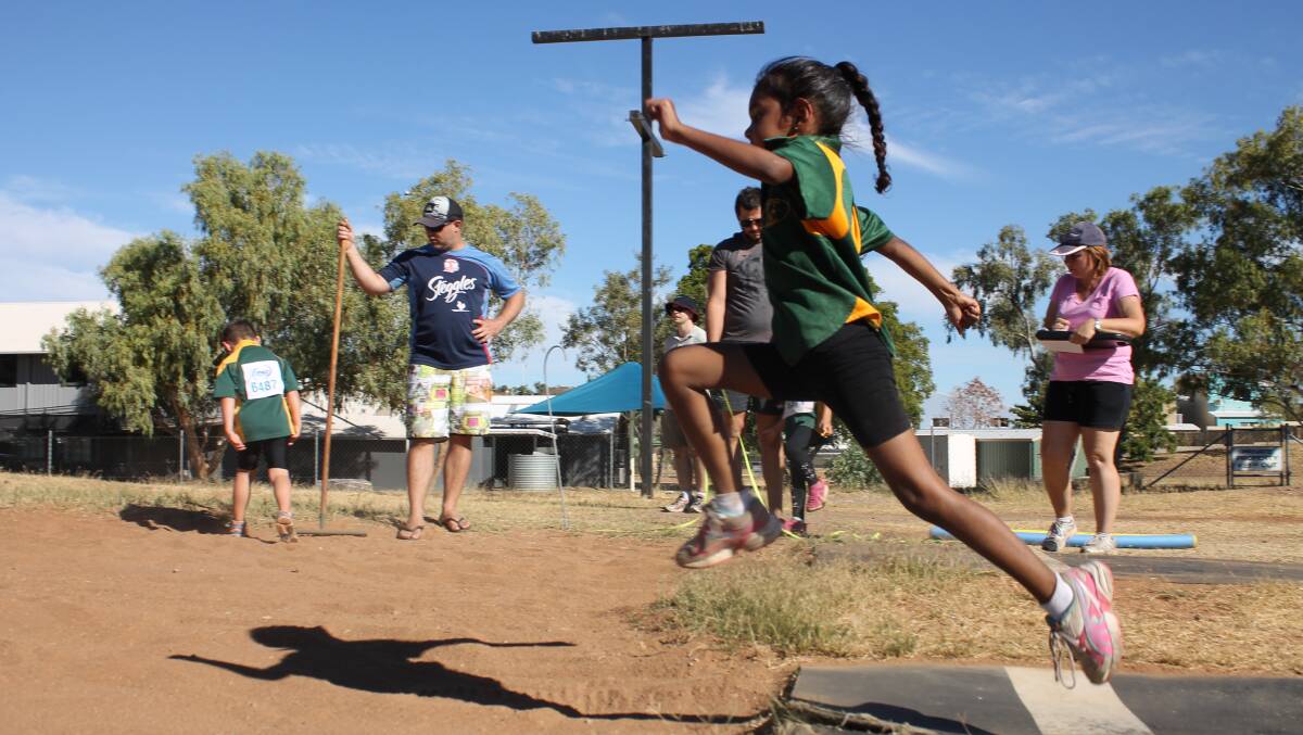 BIG STRIDE: Five-year-old Illy Chapman, daughter of Kale ``BlackFlash'' Johnson, shows good form in the long jump.