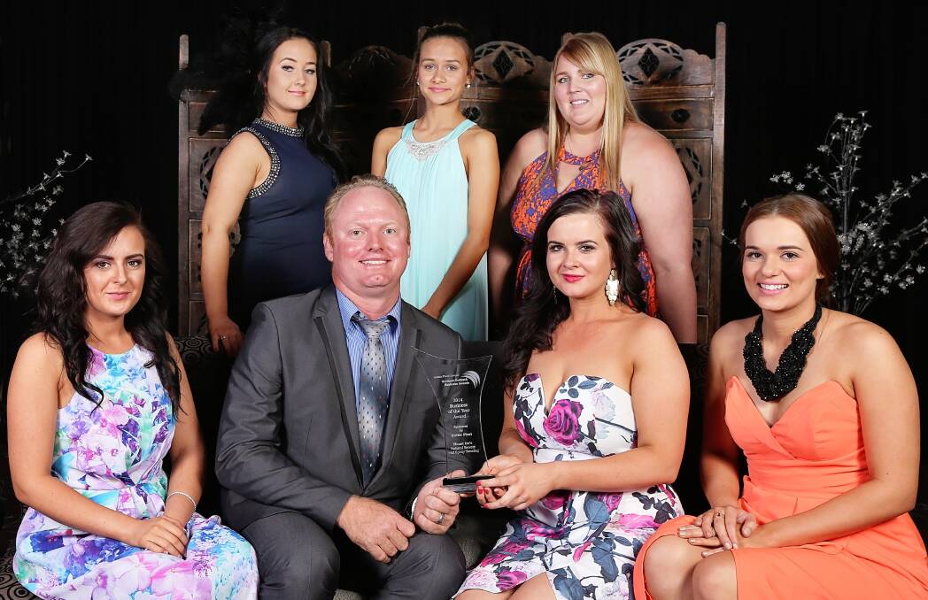 BEST OF THE BEST:  Reegyn McElligott and the Natural Beauty and Spray Tanning team with sponsor Keith Kerle, of Incitec Pivot. 
 Picture: KATE GLOVER
