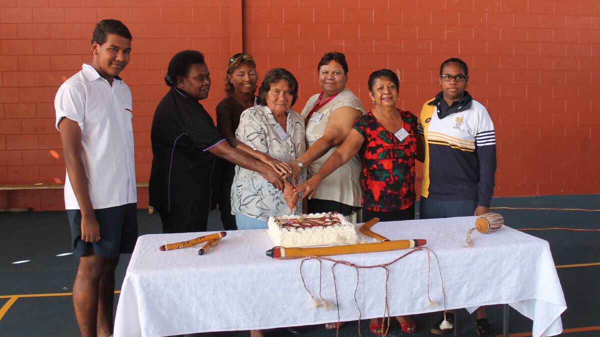  SORRY DAY: Evander Connolly, Dolly Hankin, Donna Connolly, Pearl Connolly, Elizabeth Dempsey, Colleen Muckin and Veronica Jack cut into a commemorative cake at last week's National Sorry Day Assembly.  Picture: HAILEY RENAULT
