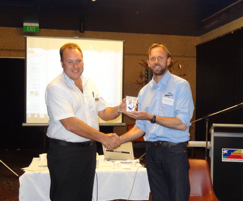 BEST DROP: qldwater chief executive officer Dave Cameron presenting Richmond’s water filtration supplier Aeramix Pty Ltd representative Mark Samblebe with an award for winning the semi-final of Orica’s Best of the Best Queensland Water Taste Test. – Picture: SUPPLIED

