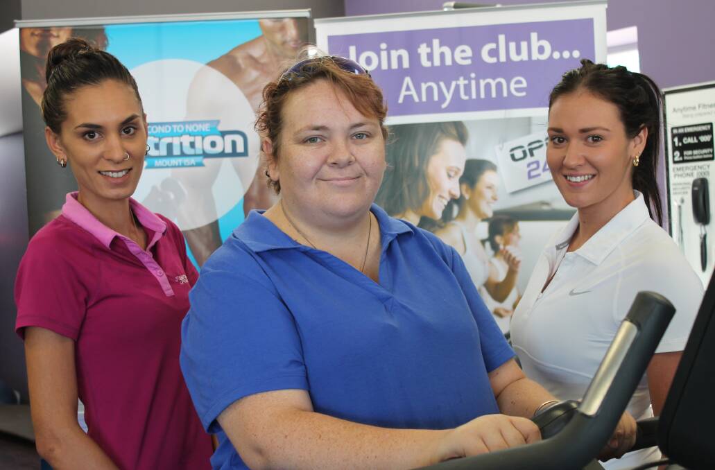 FIGHTING FOR A BETTER LIFE: Anytime Fitness Manager Chloe Oliver (left) and Second to None Mount Isa store Manager Codi Hanson (right) do their part for charity by helping Dianne Stuart (middle) reach her goal weight.