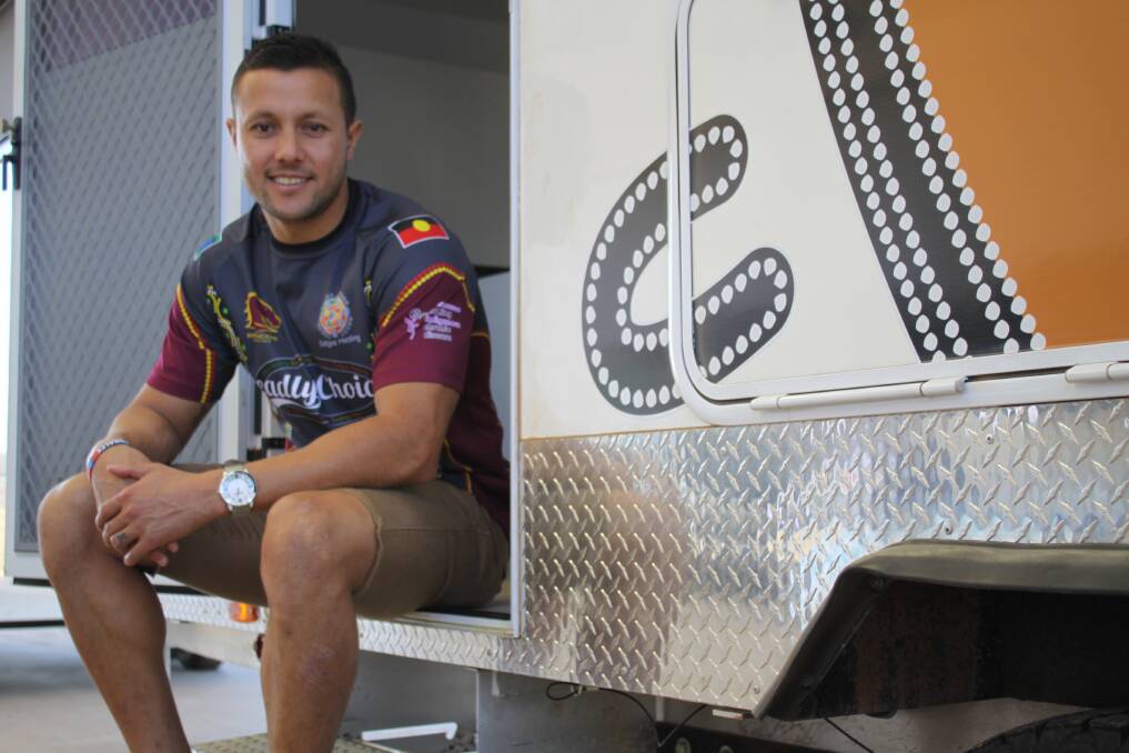 ROLE MODEL: Mount Isa legend Scott Prince outside the Gidgee Healing health bus at the health expo. 
-Picture: BRAD THOMPSON/4529
