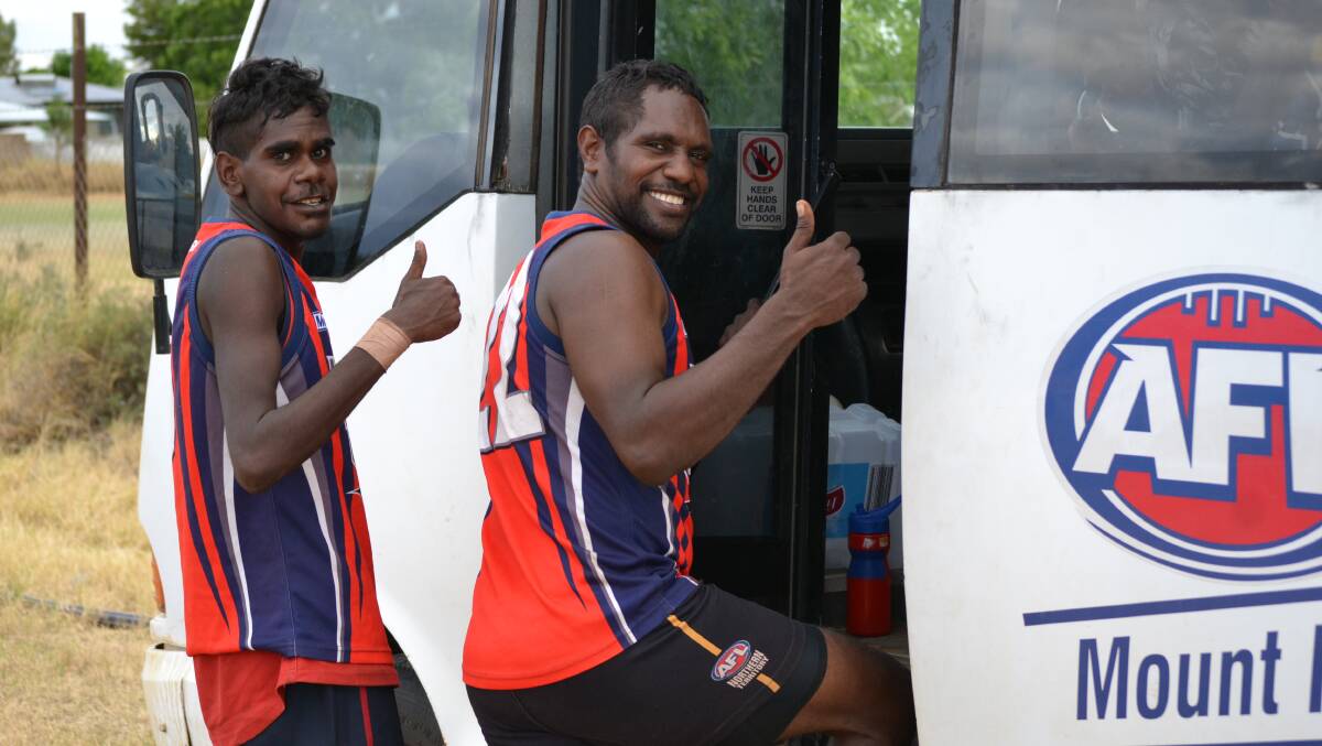 VICTORS: Garrick Ray and Aaron Williams get into the bus back to Lake Nash happy boys. - Pictures: BRAD THOMPSON/5490