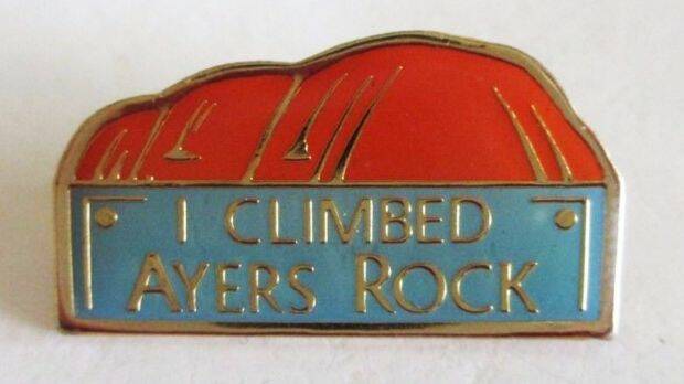 Vintage souvenirs for tourists who climbed Ayers Rock, which is now known as Uluru. 
