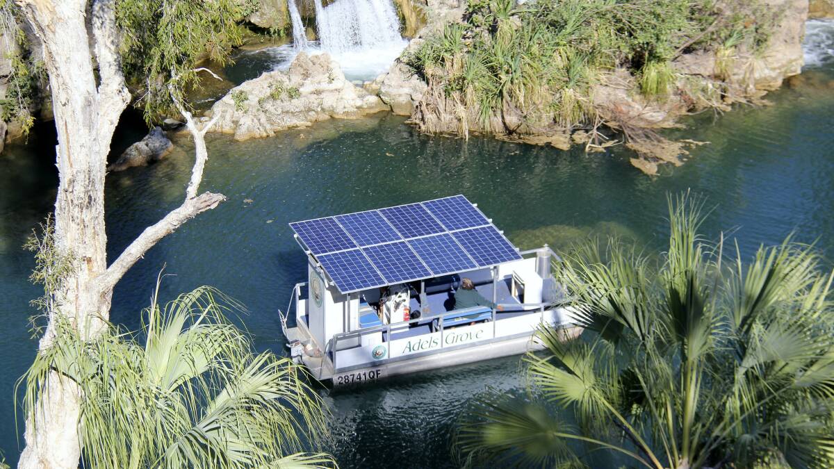 SMOOTH OPERATOR: The new Adels Grove solar electric-powered pontoon boat cruising at Lawn Hill Gorge. - Pictures: COURTESY OF Q ENERGY SOLUTIONS