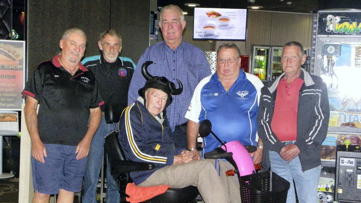 MOBILE MARVEL:  Kevin “Dutchy” Hunt and his “little beauty” mobile scooter come to a brief stop at the Buffs Club on Friday. Making sure he doesn’t scoot away are Duchess 51 Lodge representatives Ziggy Grubczynski, Jim Bowden, Bob Burdon, Stan Wilson and Denis Dyer. - Picture: JOHN WILSON