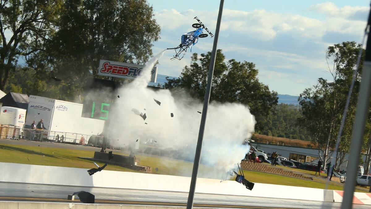 The front section of the Top Fuel dragster rockets into the air.  Photo: Dragphotos.com.au 