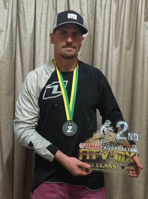 RUNNER-UP: Mount Isa quad bike rider Cody Lincoln showing off his silverware from the national Motocross championships.