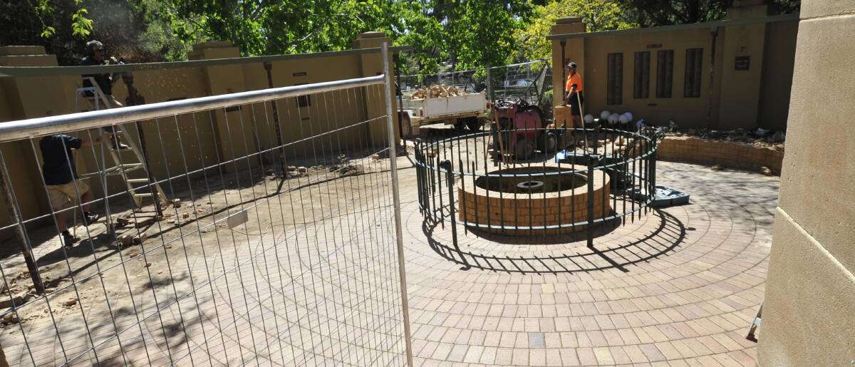 REPLACED: Wagga's old eternal flame before it was demolished for a new memorial to be opened on Tuesday morning. Picture: Les Smith