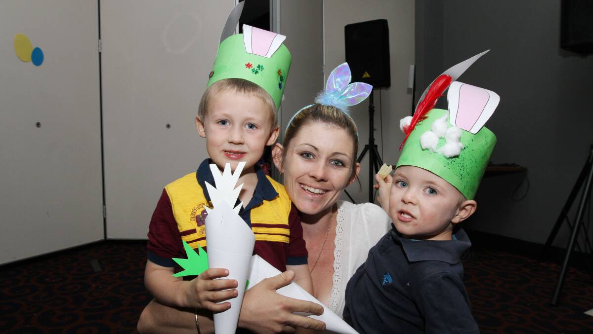 EASTER BONNETS: Will, 4, Kayla amd Zachary Oliver, 2. 