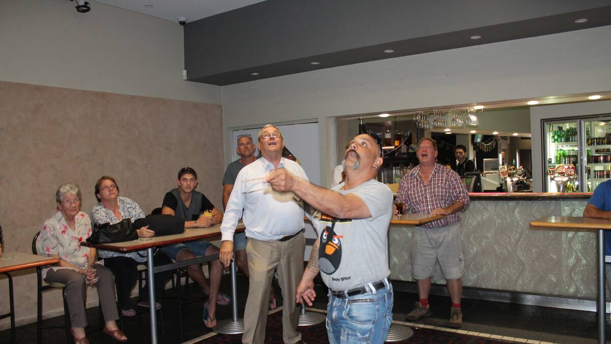 TWO-UP: Jim Nuttall and Adrian Muller took part in the two-up at the Buffs Club.
