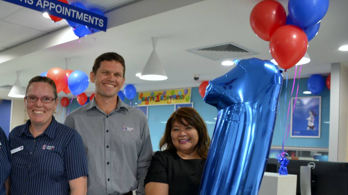 HAPPY BIRTHDAY: GP Super Clinic staff Jenny Garrett, Matthew Cain and Joy Noble celebrate the clinic’s first anniversary. 