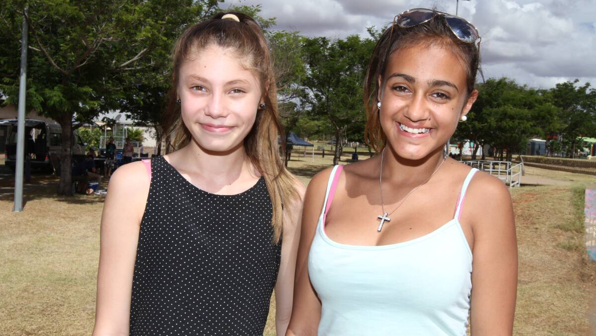 HAVING FUN: Mali Cairns, 13 and Ayesha Kirk, 13. 
