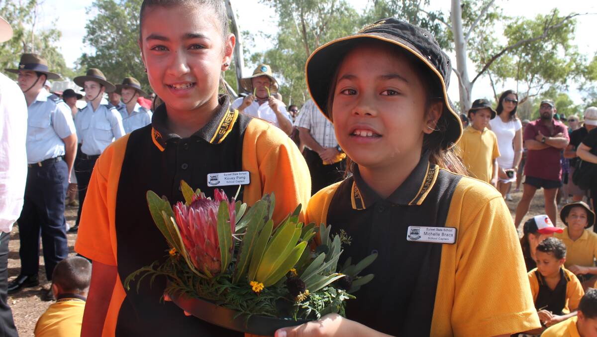 SUNSET STATE SCHOOL: Kovey Pang, 12, and Michelle Bracs, 11, represent Sunset State School at the Anzac Day ceremony.