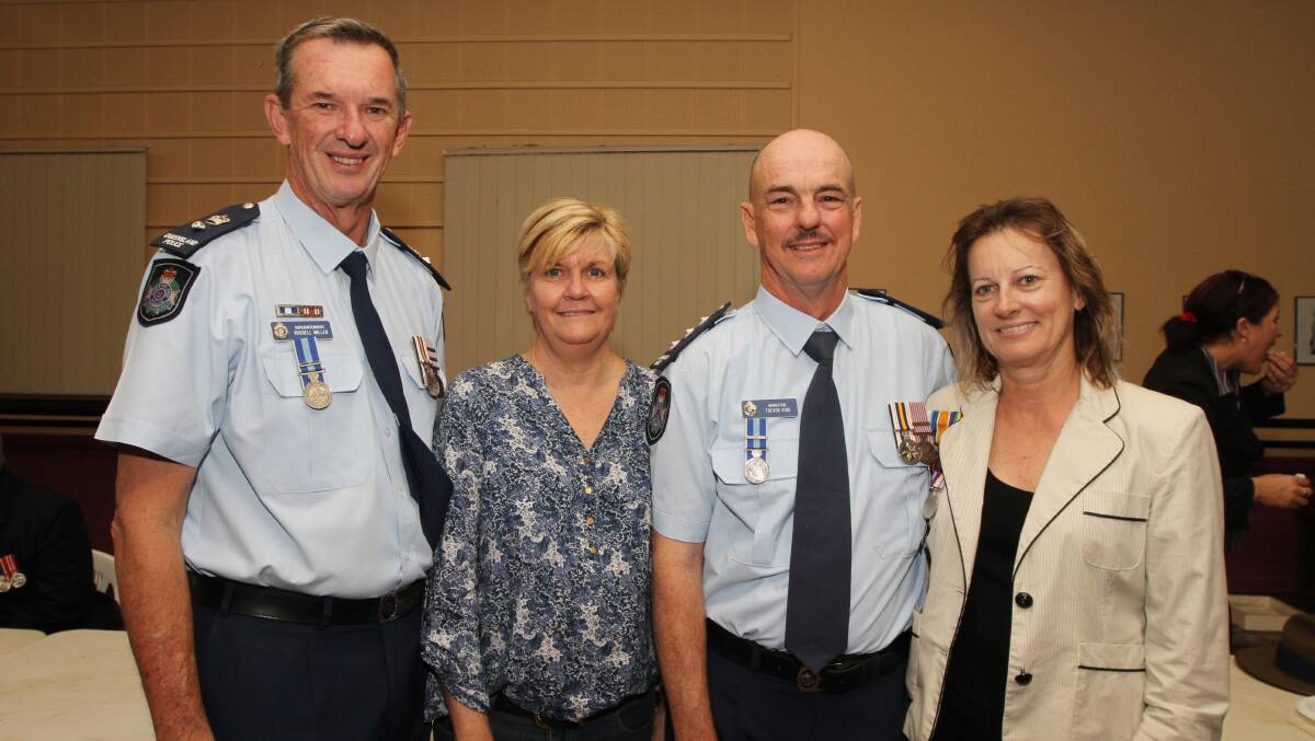LEST WE FORGET: Mount Isa Police Superintendent Russell and Vicki Miller with Mount Isa Police Inspector Trevor and Lyn Kidd.  