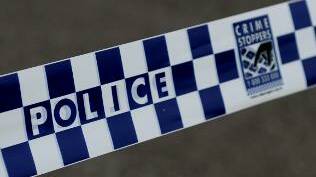 Bail for man alleged to have spat blood at paramedic and a police officer in Mount Isa 