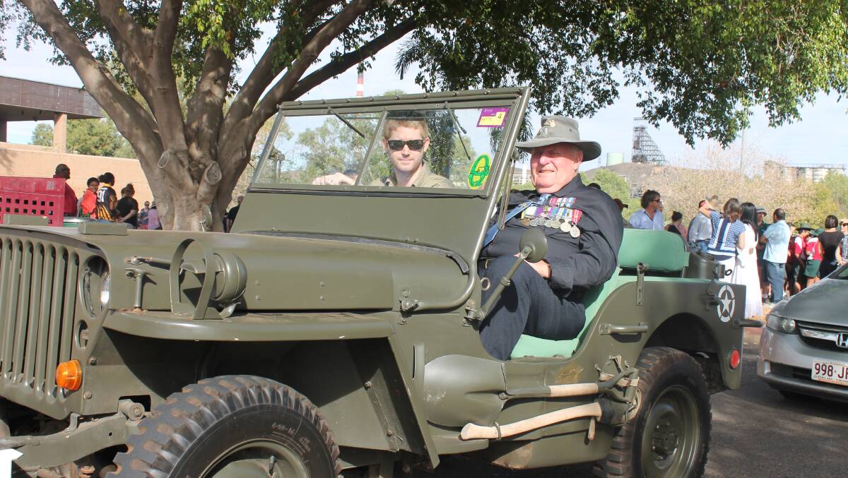 ANZAC TRANSPORT: David Lafferty and Warren Barry travel in style in the Anzac March.