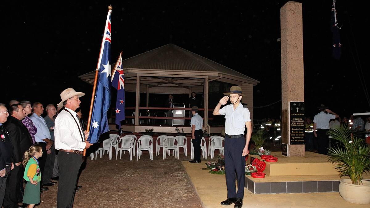 HONOUR: Cadet Corporal Marcus King salutes as the national anthem plays. 