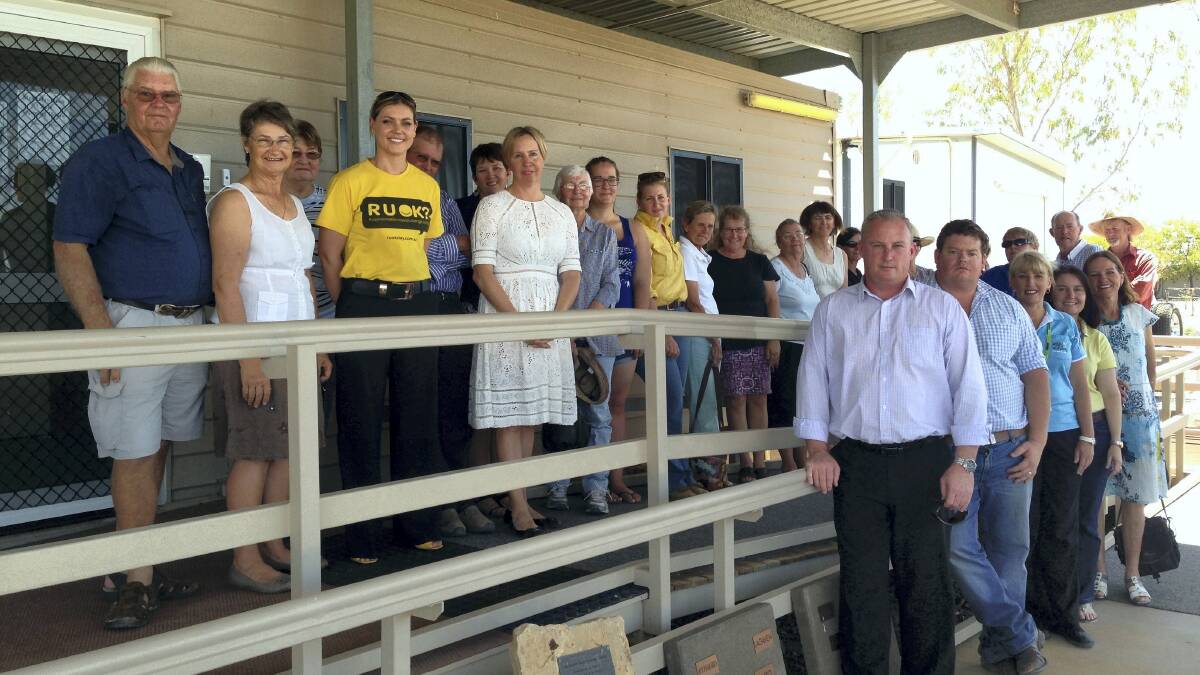 CELEBRATIONS: The McKinlay community and representatives from the North West HHS and McKinlay Shire Council celebrate the upgraded facilities.