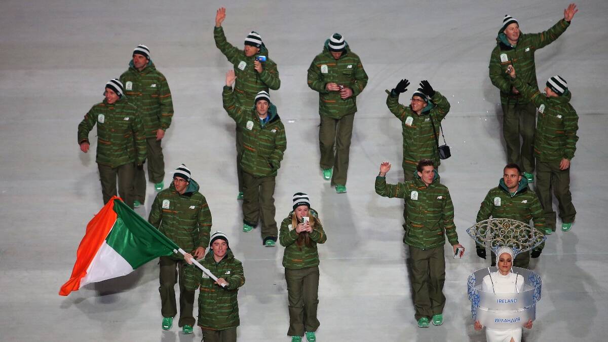 Skier Conor Lyne of the Ireland Olympic team carries his country's flag during the Opening Ceremony of the Sochi 2014 Winter Olympics at Fisht Olympic Stadium. Picture: Getty