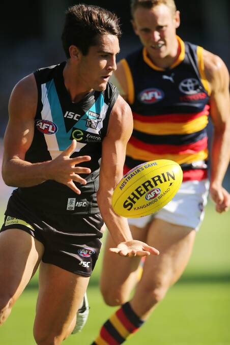 Chad Wingard of the Power wins the ball during the round two AFL match between the Port Adelaide Power and the Adelaide Crows at Adelaide Oval on March 29. Photos: Getty