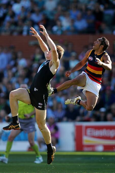 Eddie Betts of the Crows attempts a mark. Photos: Getty