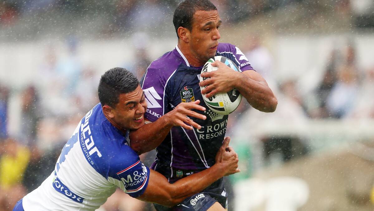 Will Chambers of the Storm is tackled by Tim Lafai. Picture: Getty