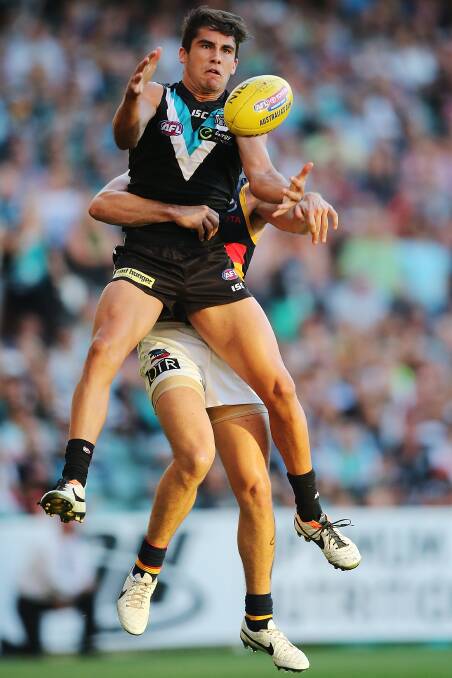 Chad Wingard of the Power takes a mark during the round two AFL match between the Port Adelaide Power and the Adelaide Crows at Adelaide Oval on March 29. Photos: Getty