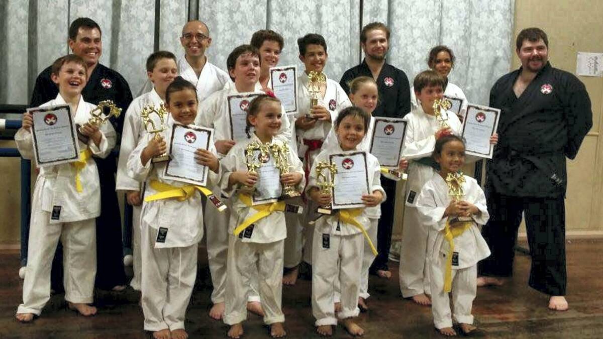 ON KYU: Mount Isa’s junior stars are all smiles at their grading.