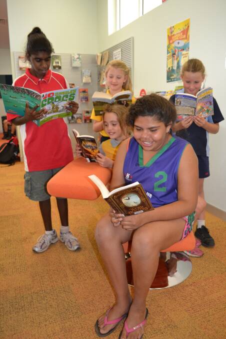 READING CLUB: Latoya Hayes, 16, Bo Caldwell, 9, Kaydee Kelly, 9, Lakisha Douglas, 12, and Jorgia Green, 9, will hopefully join the Cloncurry Shire Library’s Summer Reading Club.
