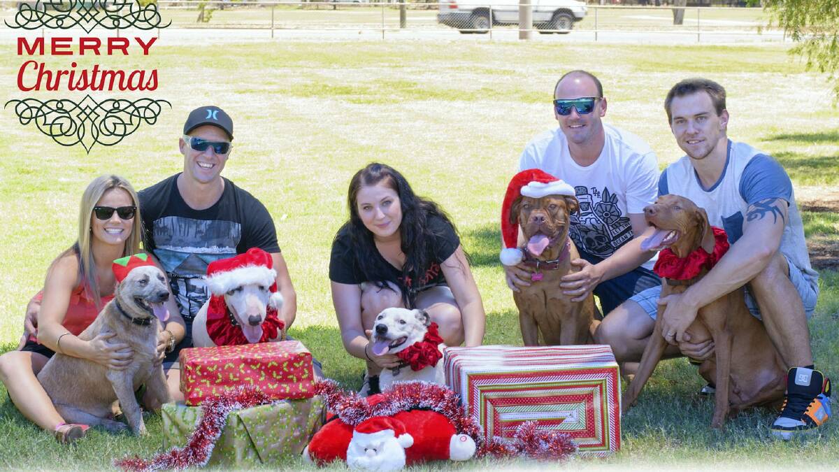 DAY OUT: Tegan and Aidan Kastermans, Jennifer Waddell, Tim McMahon and Andrew Waddell. Dogs: Conrad, Jupiter, Shrek, Harlow and Hunter. - Picture: SARAH BURNS