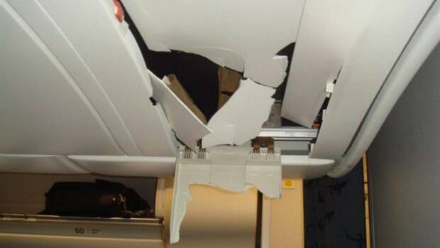Roof damage in the A330's cabin: 'It just looked like the Incredible Hulk had gone through there in a rage and ripped the place apart,' Kevin Sullivan recalls. Photo: Supplied 
