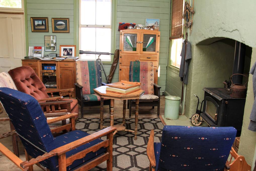 Inside the Jackeroo’s Cottage, which is filled with photo albums and books about the property's history. It has six bedrooms and sleeps 12 people. 