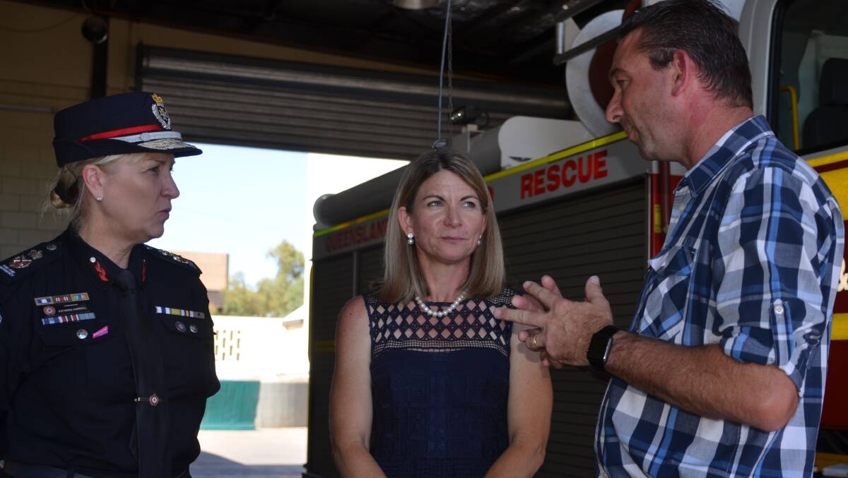 REPAIR BILL: QFES commissioner Katarina Carroll, mayor Joyce McCulloch and minister Craig Crawford talk about Mount Isa roads. 