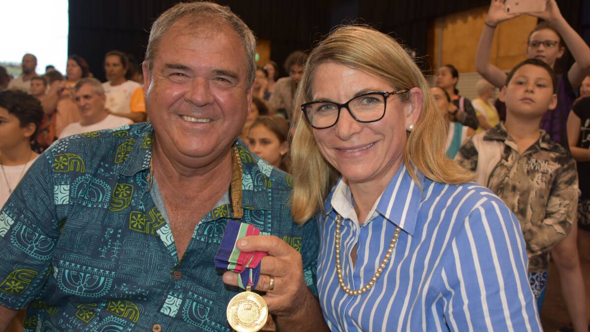 OUR WINNER: Trevor Morris with his Commonwealth Games gold medal with Mayor Joyce McCulloch in Mount Isa on Tuesday. Photo: Lydia Lynch
