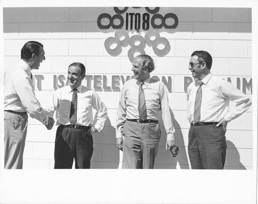 BRINGING TELEVISION TO MOUNT ISA: Herb Lilburn (far right) in 1971 in front of the ITQ8 Mt Isa building on Camooweal Street. - zz