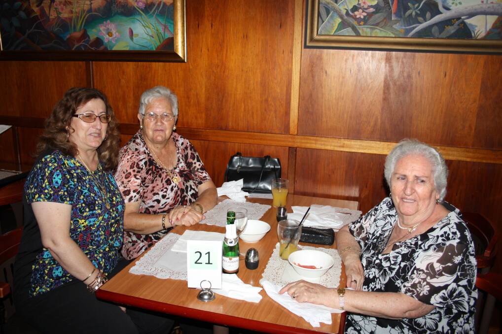 TIME WITH FRIENDS: From left, Telma and Carmen Martinez enjoy lunch at the Irish Club with Josephine Gonzalez.