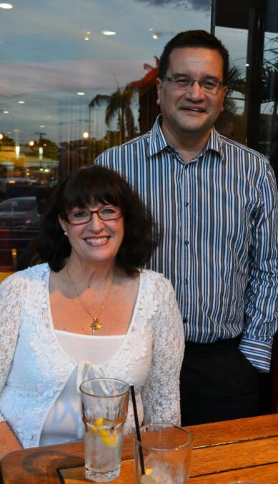 VISITORS: Cathrine Sullivan and Pablo Rivas, from Western Australia, enjoy some relaxed drinks while visiting Mount Isa.
