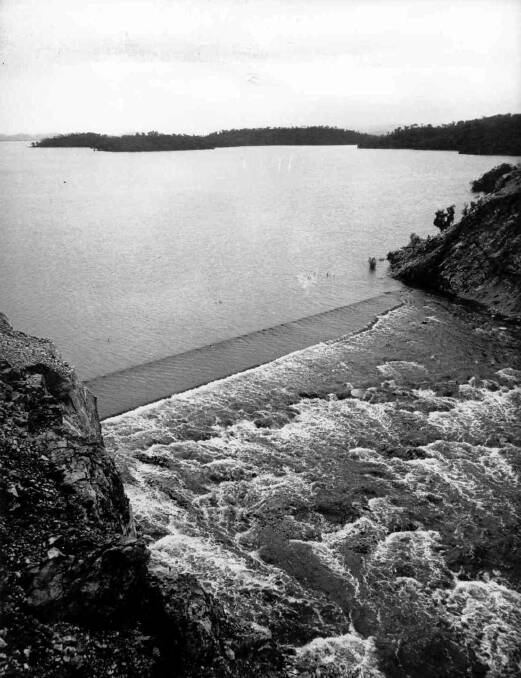 OVERFLOW: The first spillway overflow on March 3, 1962.