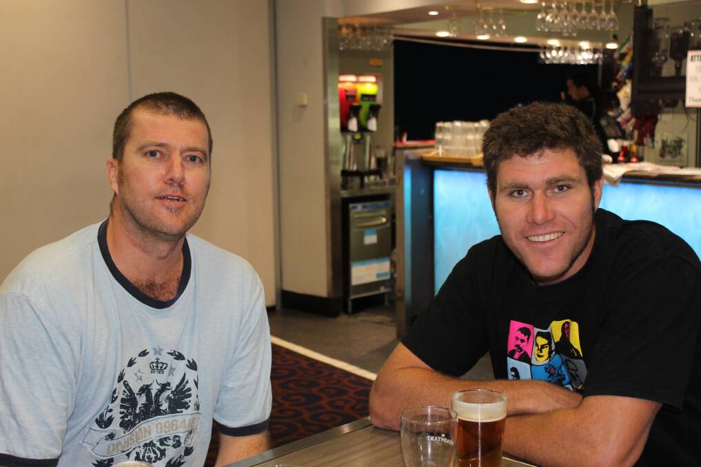 CHILLED: Craig Snyman, left and Kent Munroe enjoy a quiet weekend.