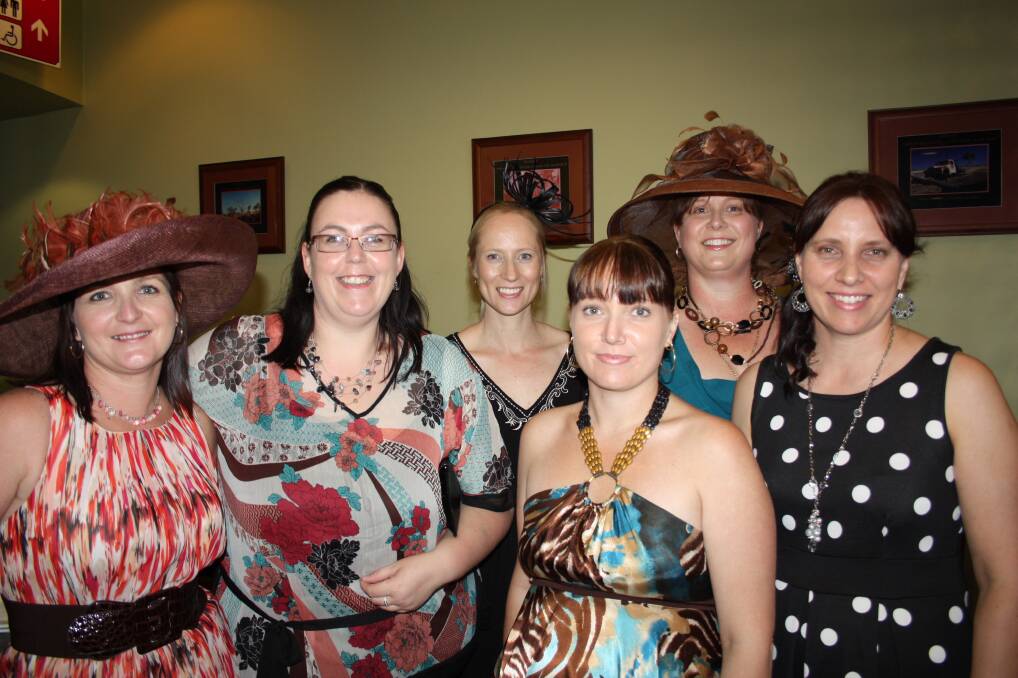 DRESSED FOR SUCCESS: Kerry Mitchell, Julie-Anne Bush, Jennifer Castree, Tracey Kitson, Mary-Jane Caldwell and Fiona Marten at The Buffs Club.