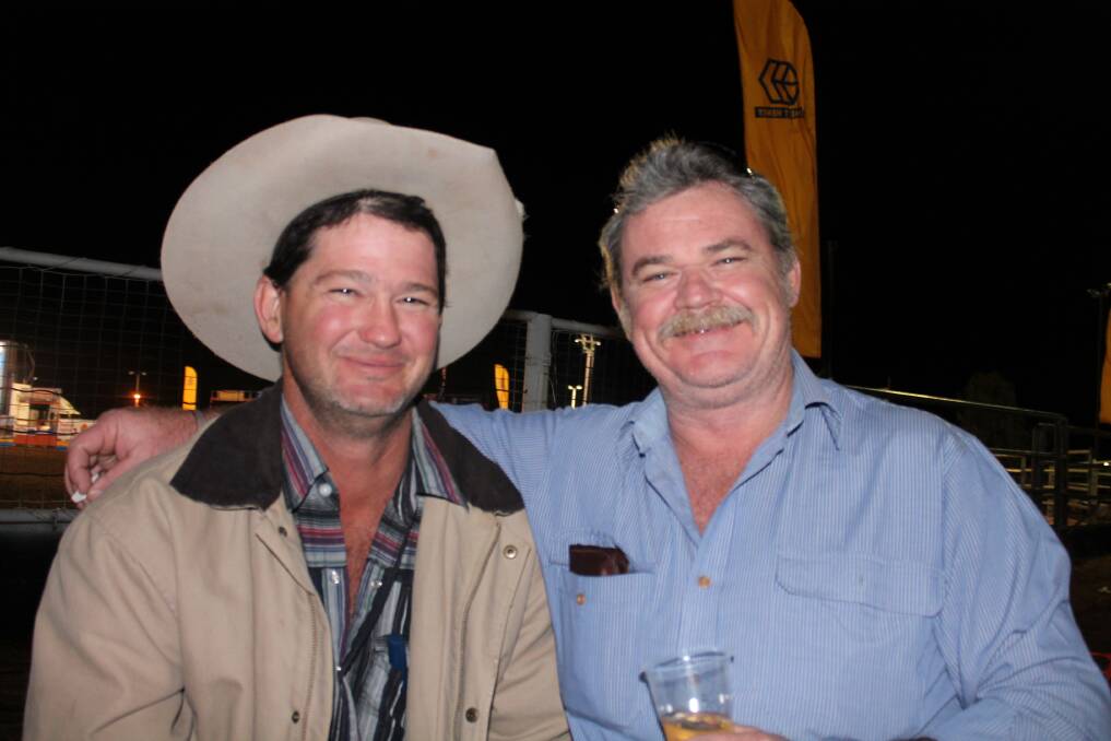 HAPPY GUYS: Lyle Wallace and Dave Tierney check out some Merry Muster action.