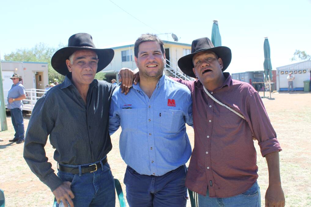 STAR STRUCK: Billy and Dennis Willetts were excited to pose with their NRL idol, Brisbane Bronco and North Queensland Cowboys star Carl Webb.