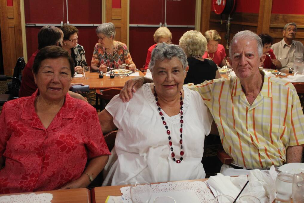 CATCH-UPS: Evelyn Bragg, Pat O'Grady and Ted Bragg enjoy catching up before Christmas.