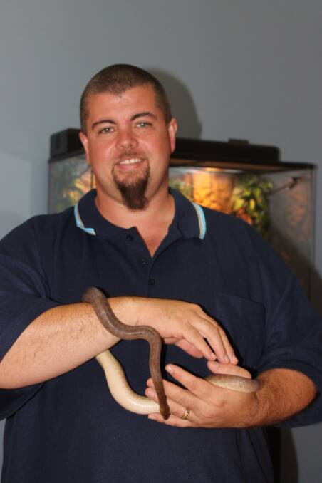 SNAKE SAFETY: Snake catcher Gavin Lawrence said education is the key when dealing with snakes. - Picture: JASMINE BARBER/7523
