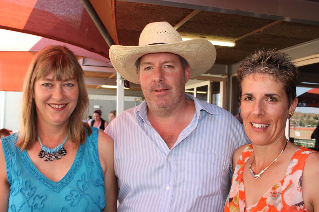 OUT AND ABOUT: From left, Gayle Steed with Kelvin and Nancy Ward.